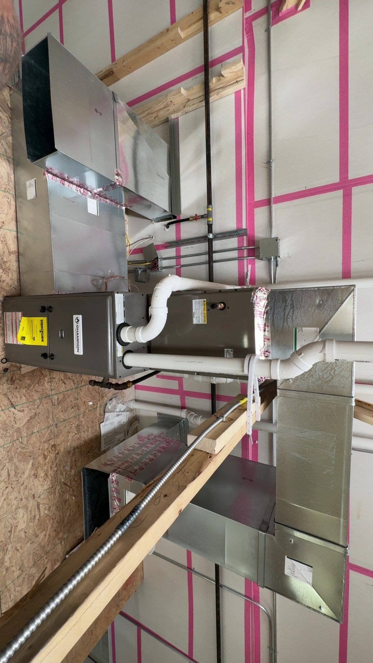Champion furnace with ductwork in new construction building near Cody Wyoming
