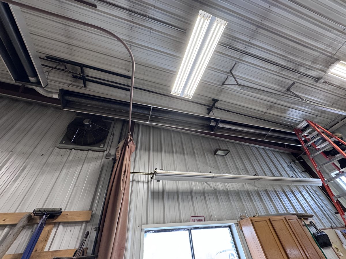 Shop ductwork installation with overhead trunk line